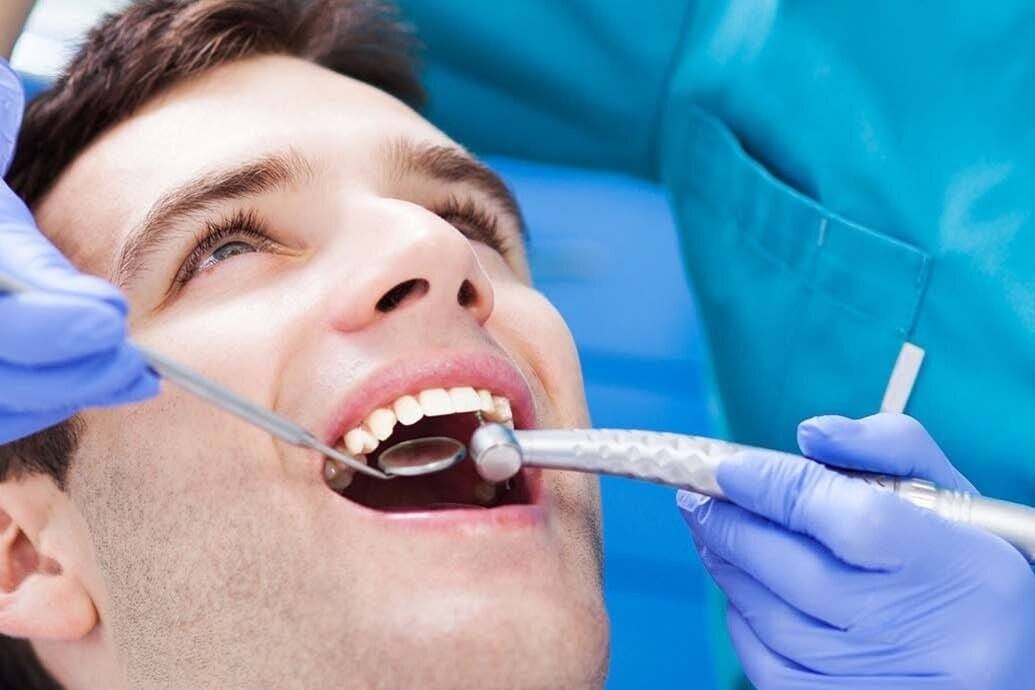 جراحی میکروسکوپیک دندان‌عقل نهفته کلینیک دندانپزشکی دکتر مسعودی